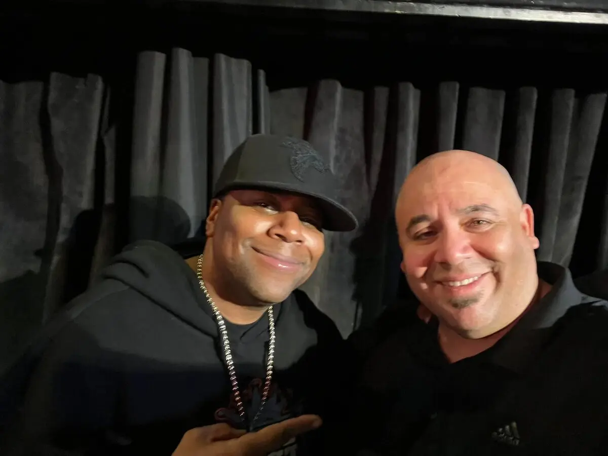 Carlos with Kenan Thompson